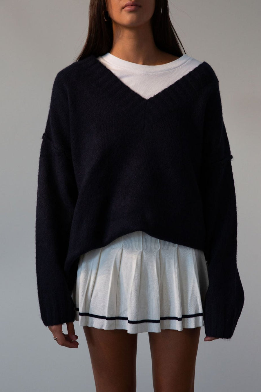 Pleated knit skirt. Elastic waistband. Shorts lining. white skirt. tennis skirt. fashion tennis skirt. preppy skirt. preppy outfit. fall outfit