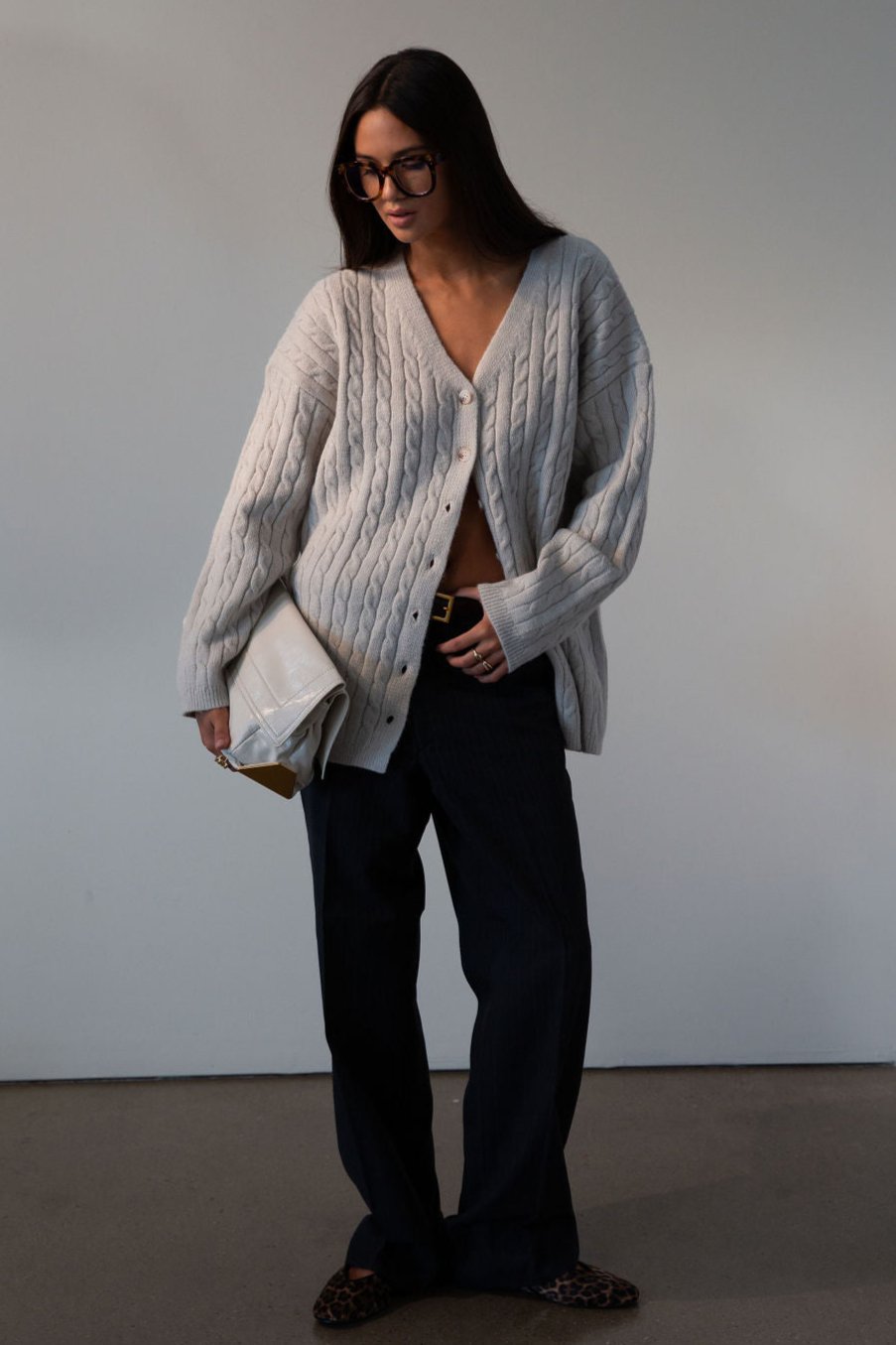 Fuzzy cable knit cardigan. Long sleeves. Front button down closures. Unlined. grey cardigan. grey sweater. fall outfit