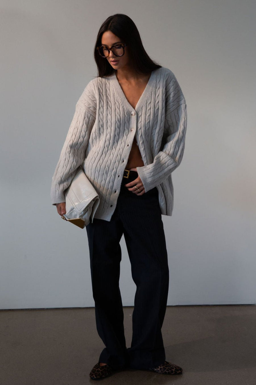 Fuzzy cable knit cardigan. Long sleeves. Front button down closures. Unlined. grey cardigan. grey sweater. fall outfit
