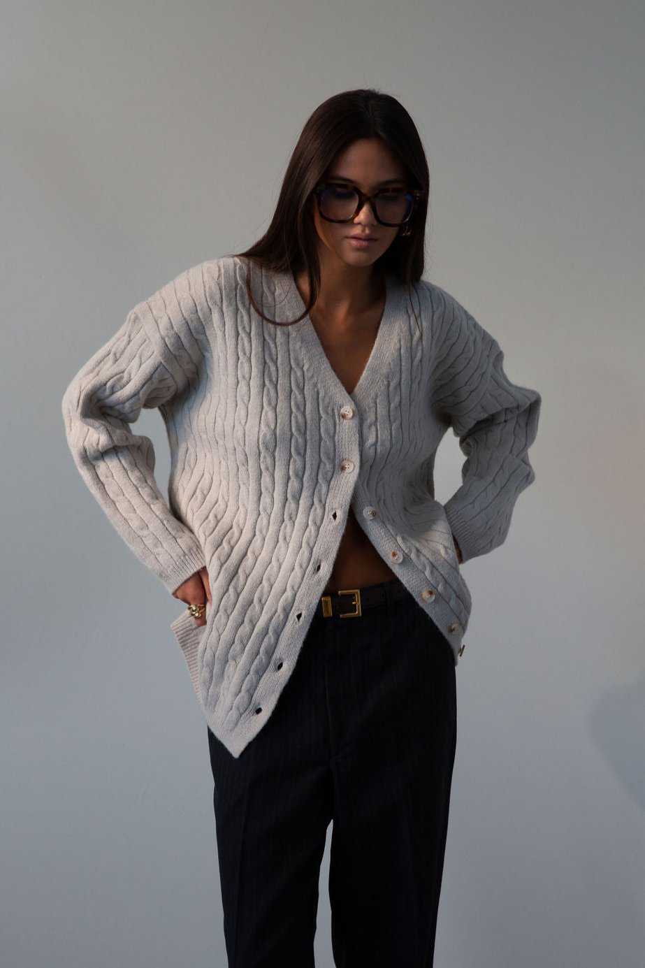 Fuzzy cable knit cardigan. Long sleeves. Front button down closures. Unlined. grey cardigan. grey sweater. fall outfit