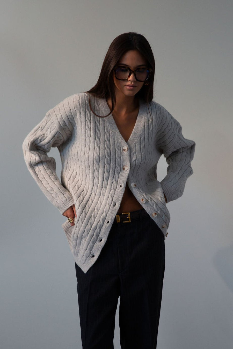 Fuzzy cable knit cardigan. Long sleeves. Front button down closures. Unlined. grey cardigan. grey sweater. fall outfit