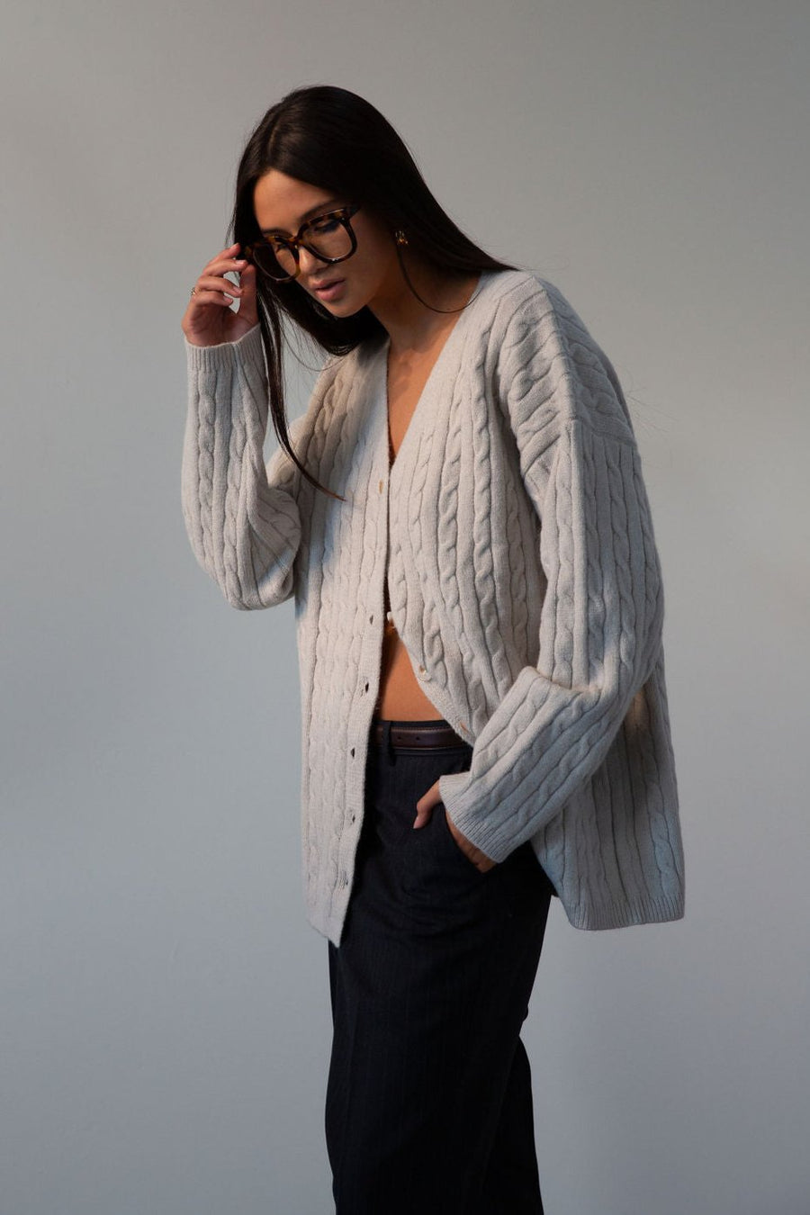 Fuzzy cable knit cardigan. Long sleeves. Front button down closures. Unlined. grey cardigan. grey sweater. fall outfit
