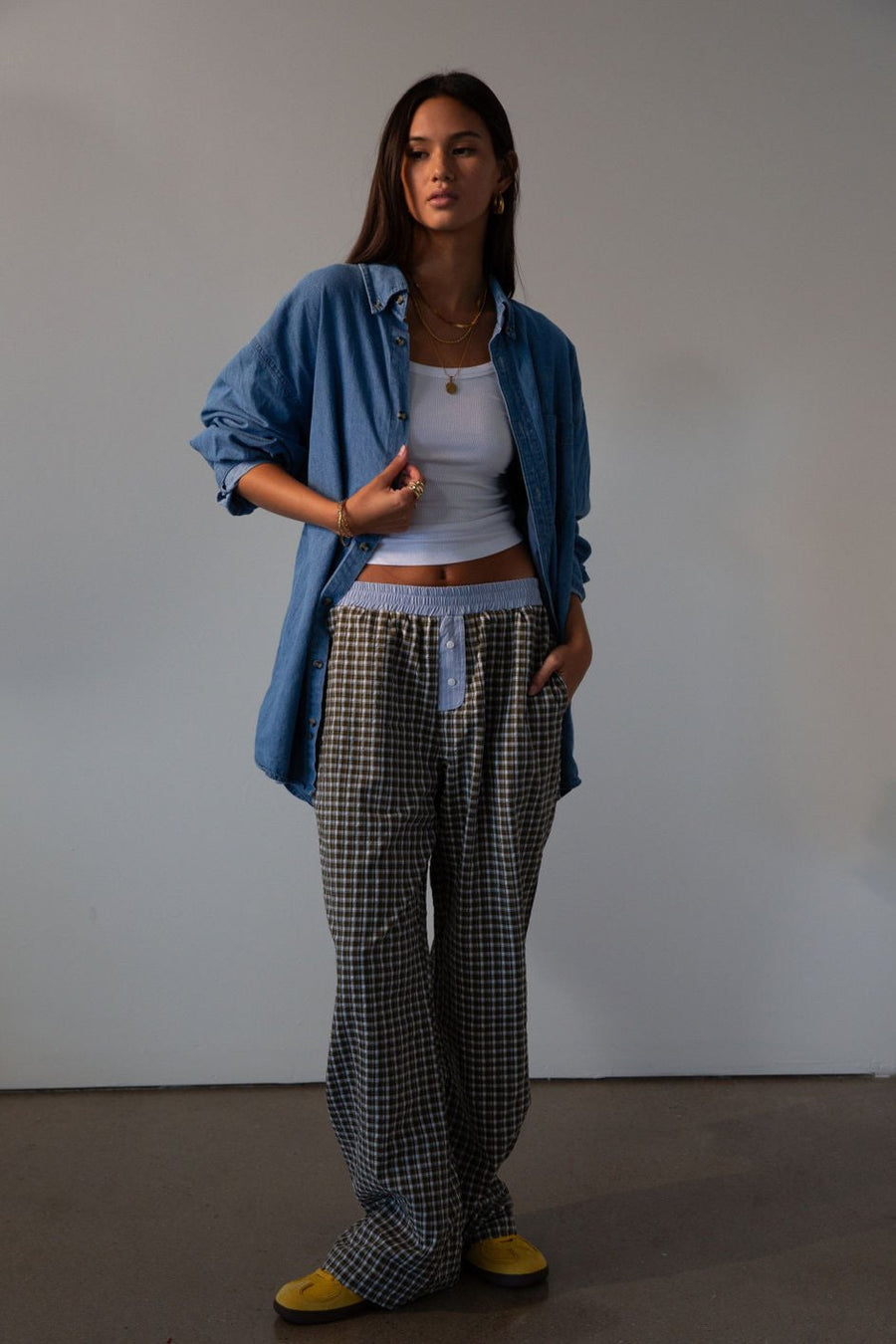Plaid woven pants. Elastic waistband. Faux button fly. Side pockets. Fully lined. lounge pants. boxer pants