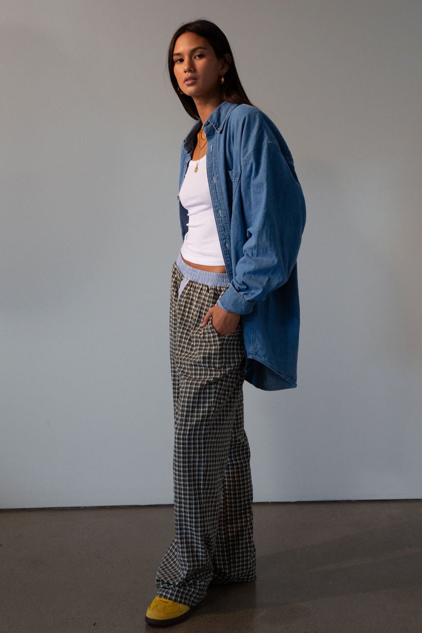 Plaid woven pants. Elastic waistband. Faux button fly. Side pockets. Fully lined. lounge pants. boxer pants