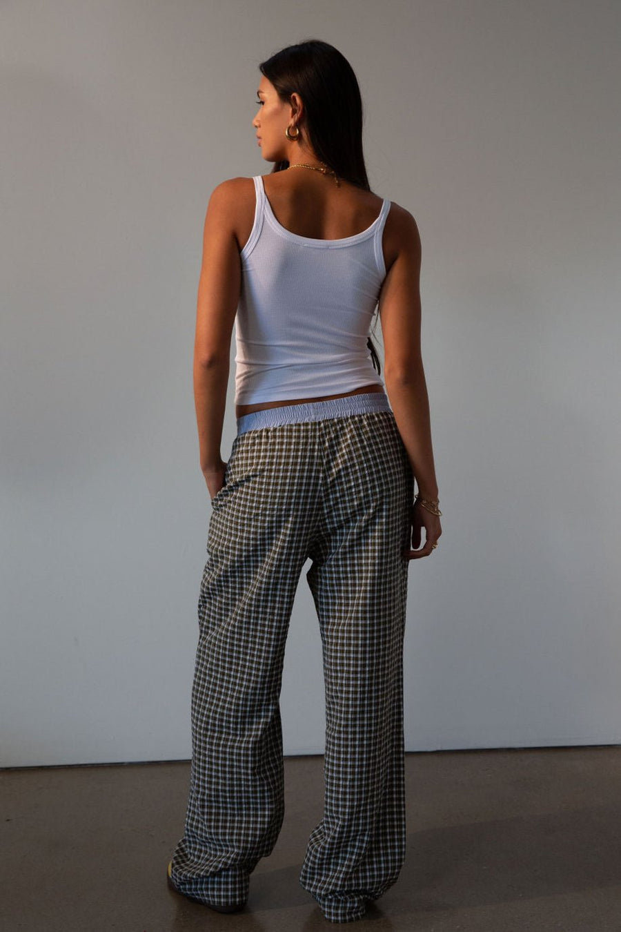 Plaid woven pants. Elastic waistband. Faux button fly. Side pockets. Fully lined. lounge pants. boxer pants