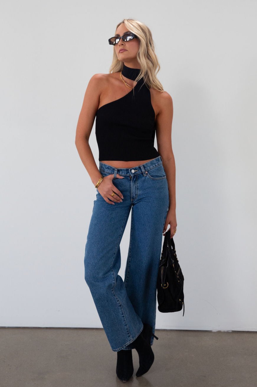 Ribbed knit cropped tank. Asymmetric neckline with adjustable halter tie. Unlined. black tank. fall outfit. fall top. going out top