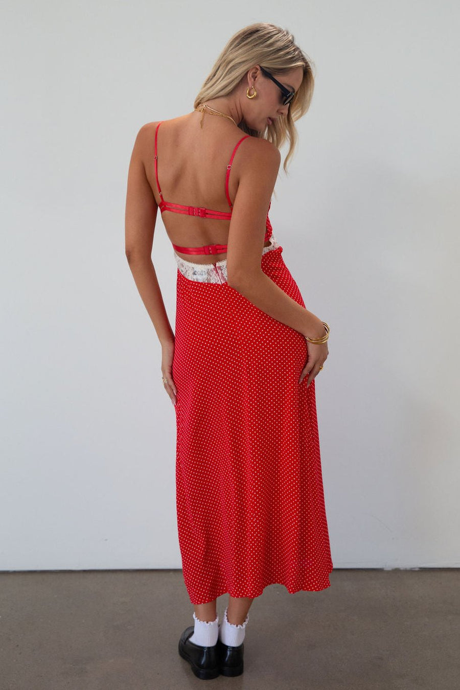 Polka dot printed woven maxi dress. Lace details. Adjustable straps. Underwire cups. Back hook and eyes and zipper closures. Unlined. red polka dot midi dress. summer dress. fall dress. 
