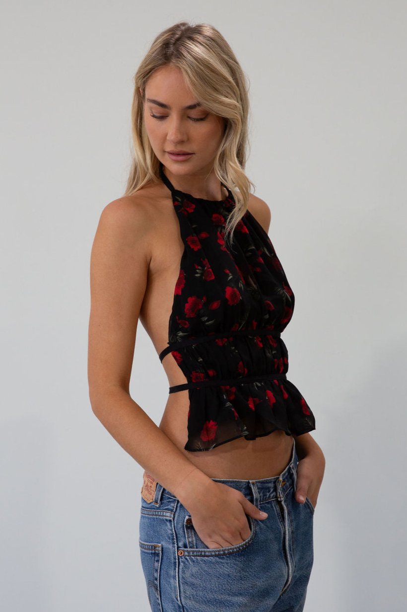 Floral printed chiffon crop top. Adjustable halter neckline with tie closure. Adjustable back tie closures. Fully lined. rose shirt. going out top. fall top. fall going out top. fall outfit