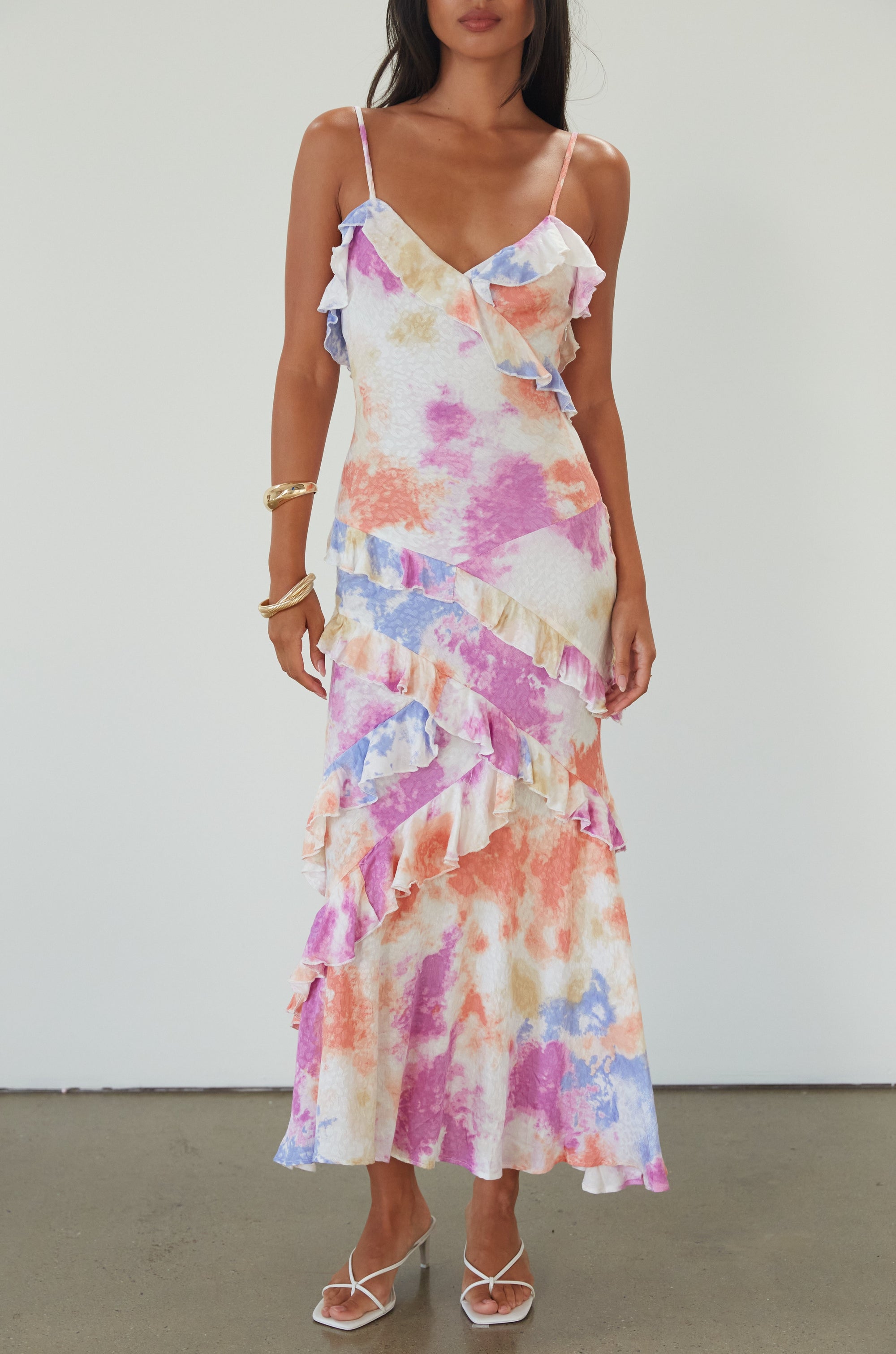 Printed textured woven maxi dress. Adjustable straps. Side hook and eye and zipper closures. Ruffle trim. Unlined. Summer maxi dress. wedding guest dress. 