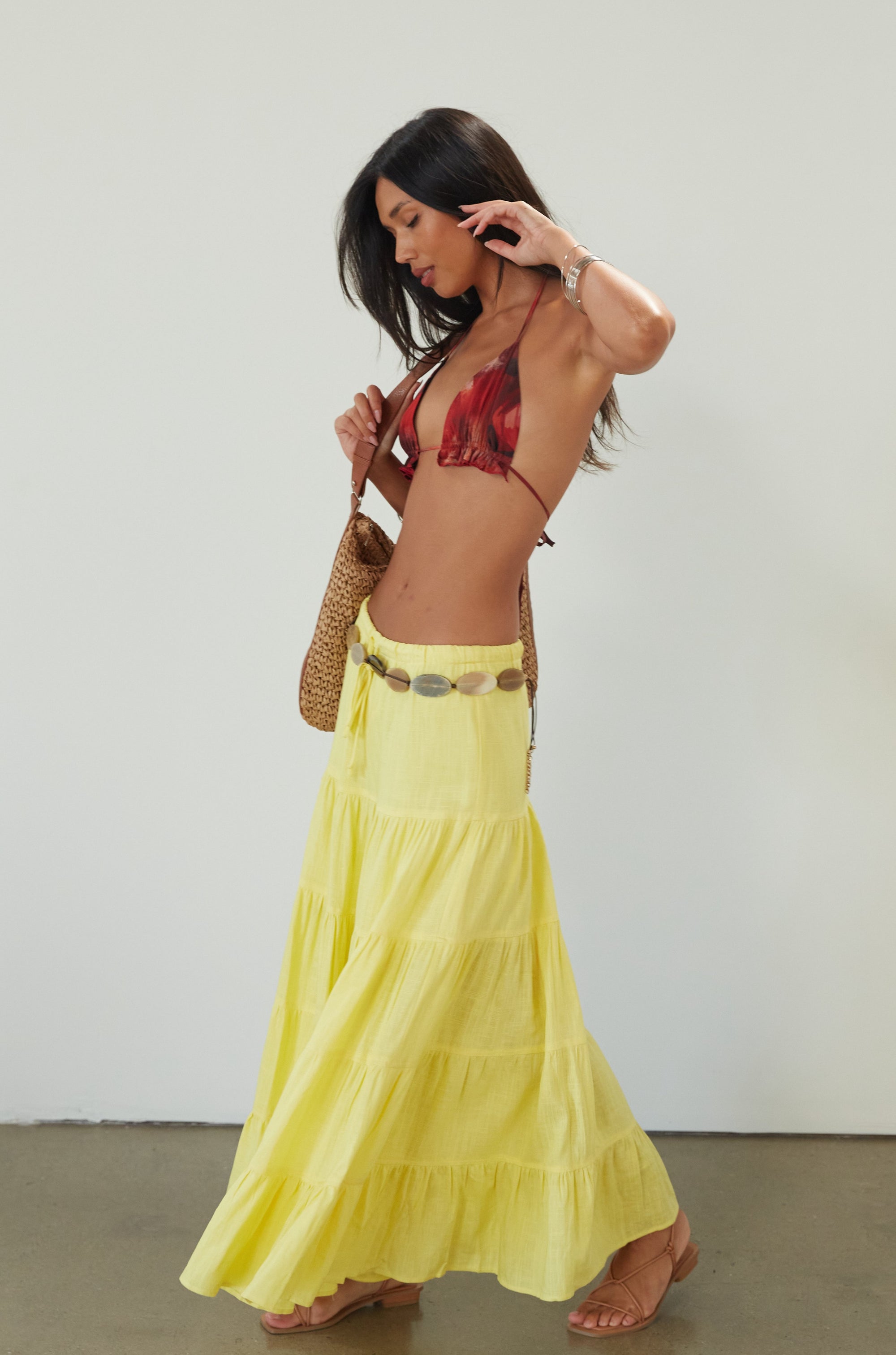Woven tiered maxi skirt. Elastic waist with drawstring closure. Partially lined. yellow maxi skirt. summer maxi skirt. 