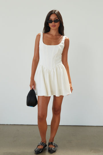 Woven sleeveless dress. Boning in bodice. Back hook and eye closures. Fully lined. off white mini dress. white mini dress. cream mini dress. bridal shower dress. bridal dress