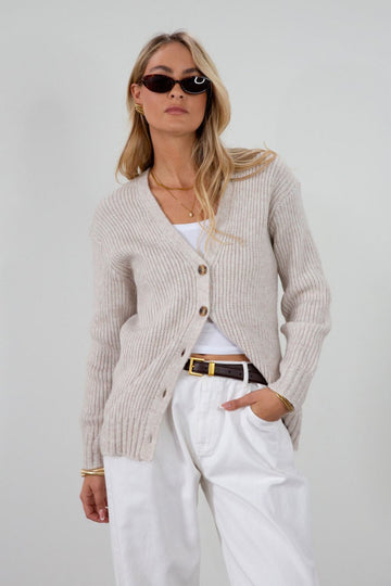 Fuzzy heather crochet knit cardigan. Front button down closures. Unlined.