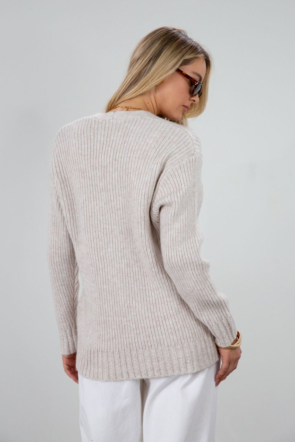 Fuzzy heather crochet knit cardigan. Front button down closures. Unlined.