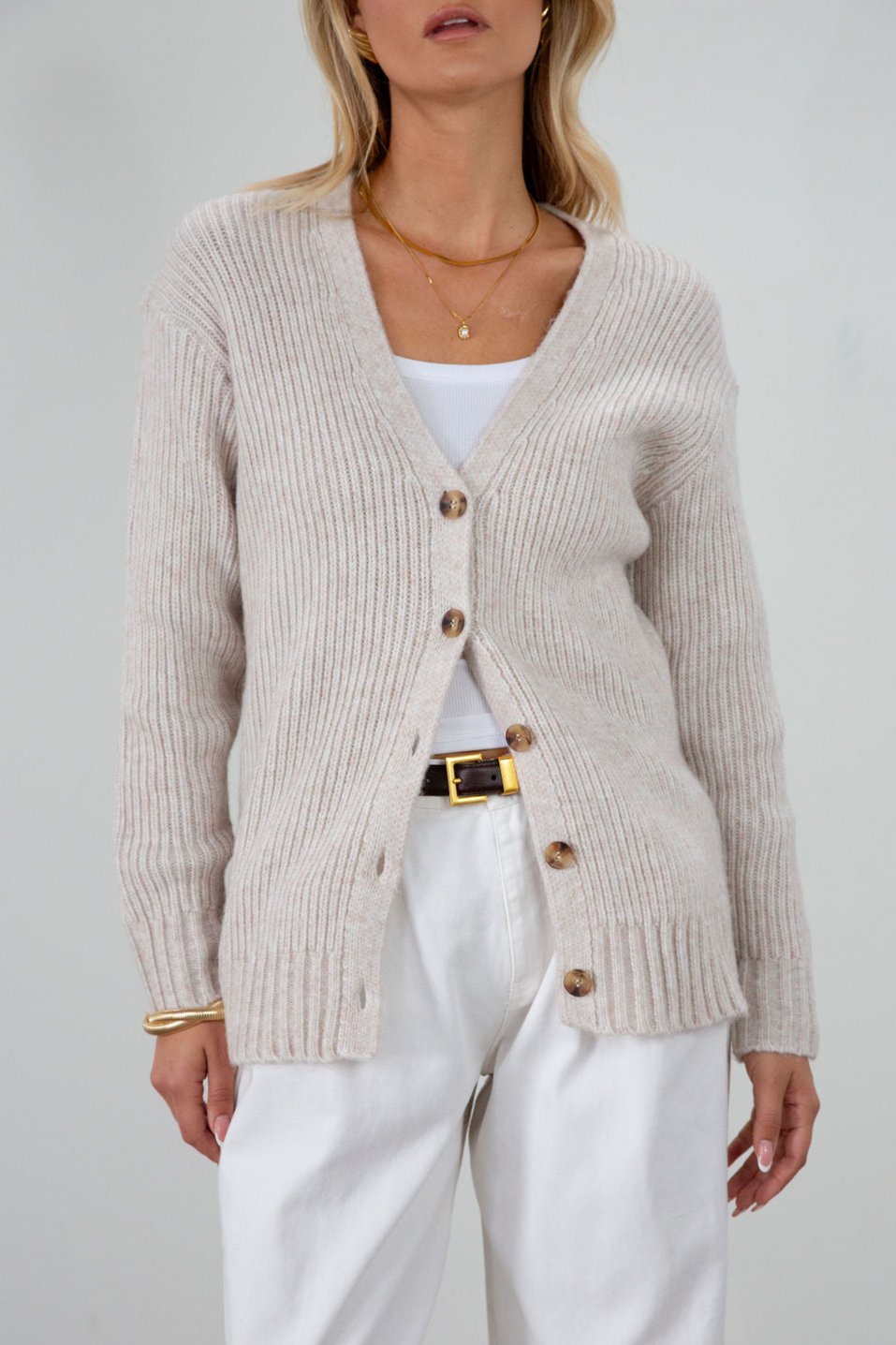 Fuzzy heather crochet knit cardigan. Front button down closures. Unlined.