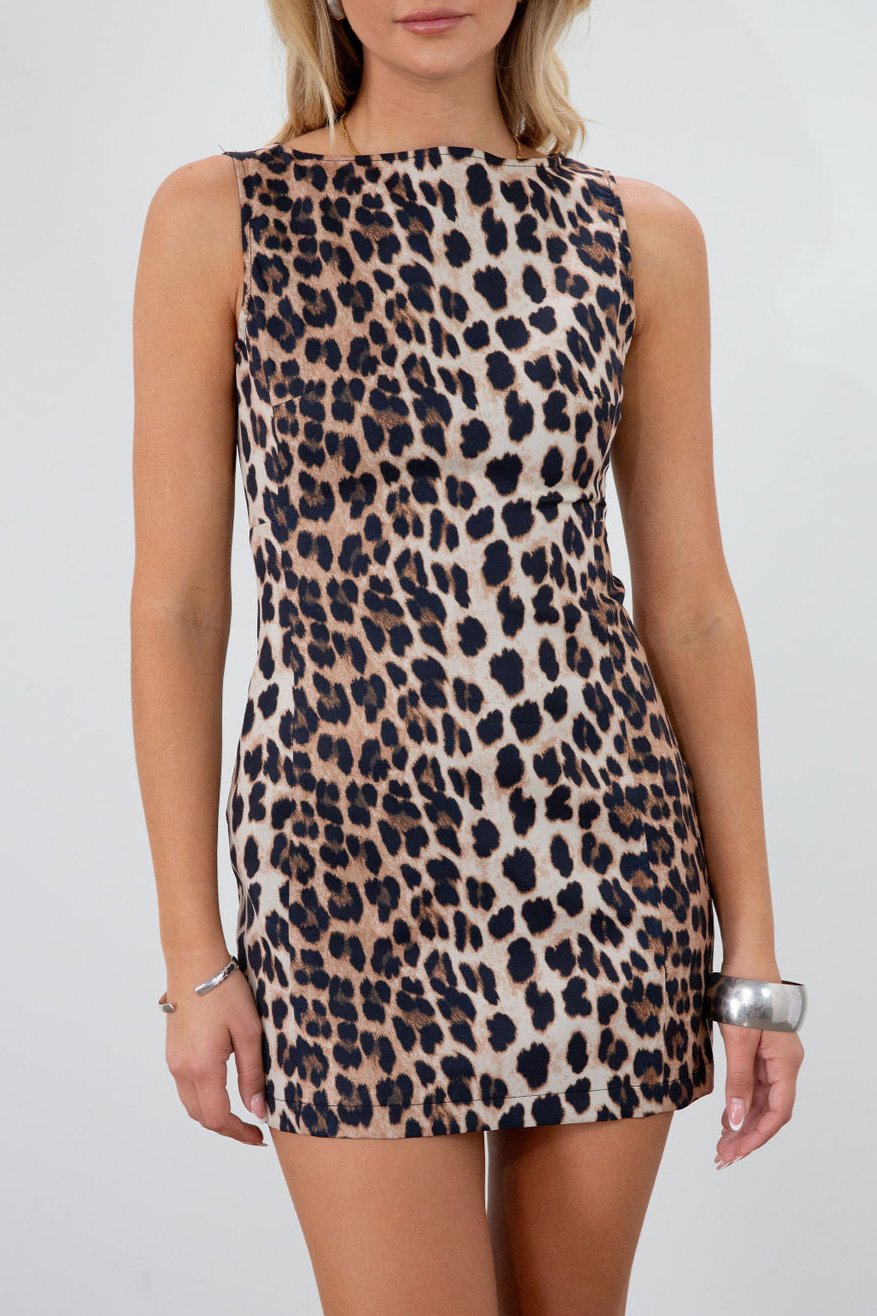 Animal printed woven dress. Sleeveless. Back hook and eye and zipper closures. Unlined. leopard mini dress. fall outfit. fall dress