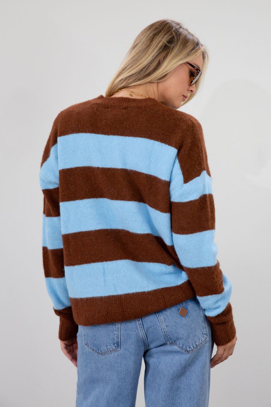 Fuzzy knit striped sweater. Crewneck. Long sleeves. Unlined. blue and brown striped sweater. fall top. fall sweater. fall outfit.
