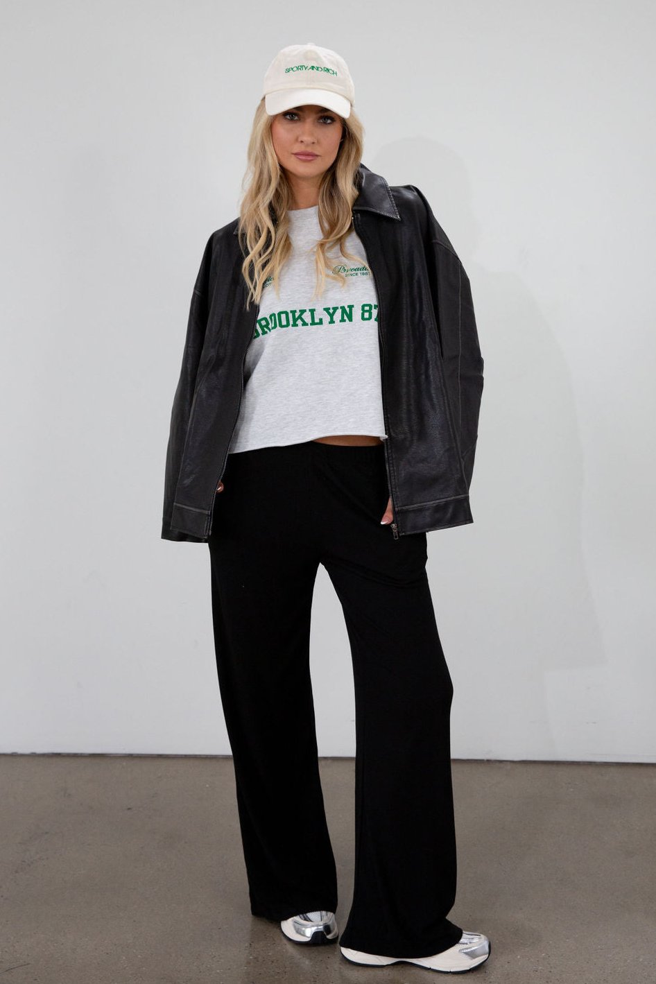 Ribbed knit pants. Elastic waistband. Side pockets. Unlined. black lounge pant