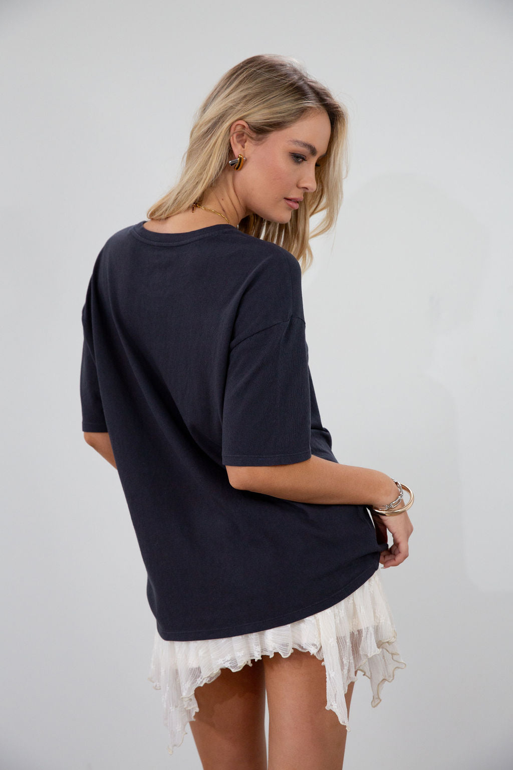 Graphic printed knit tee. Crewneck. Short sleeves. Unlined.