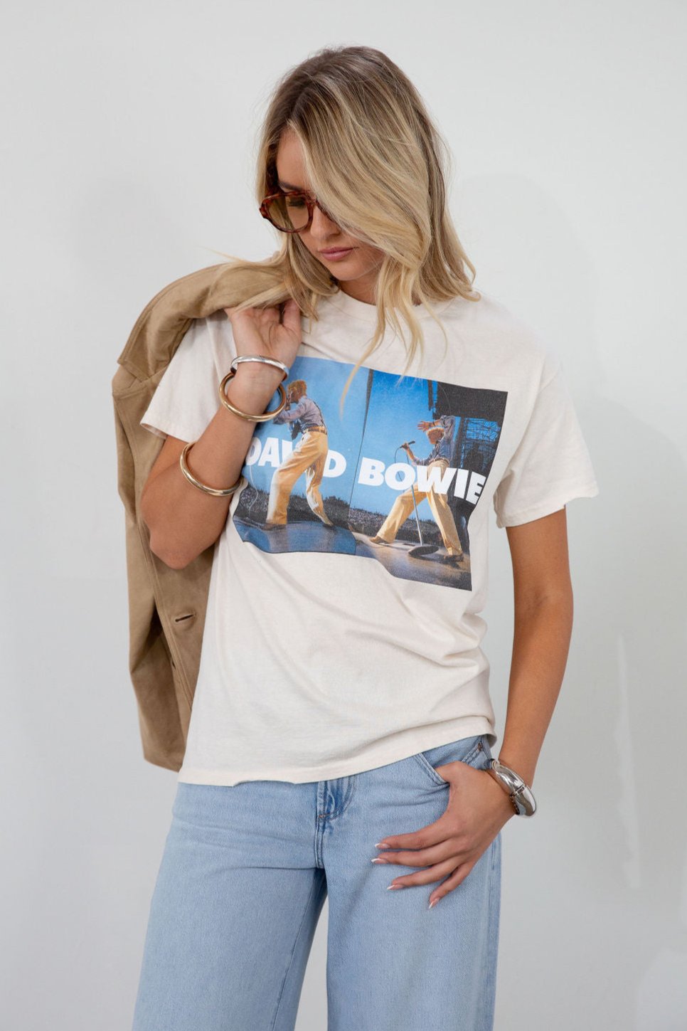 Graphic printed knit tee. Crewneck. Short sleeves. Unlined. david bowie graphic tee.