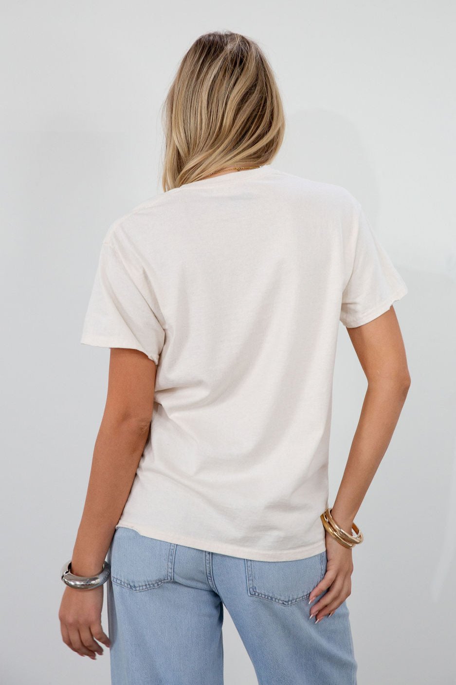 Graphic printed knit tee. Crewneck. Short sleeves. Unlined. david bowie graphic tee.