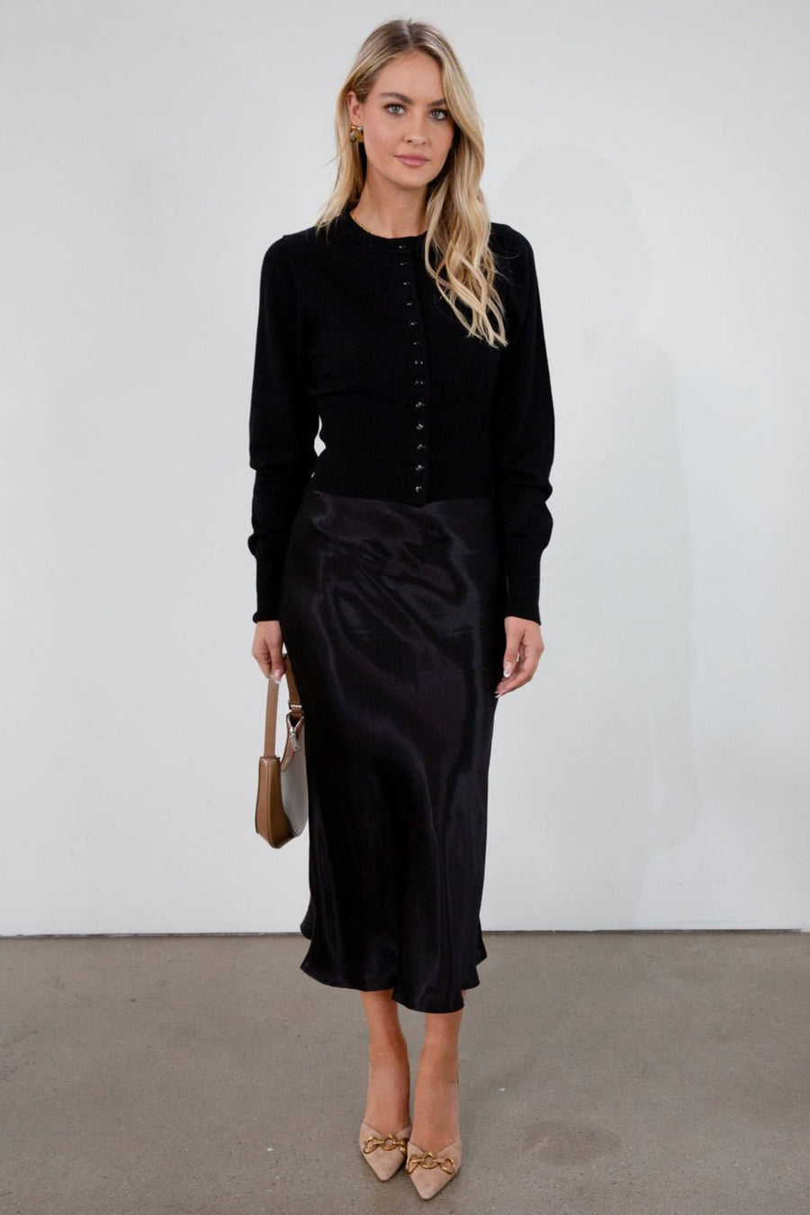 Black satin maxi skirt. Elastic waist. Side hook and eye and zipper closures. Unlined. fall skirt. fall bottom. holiday skirt