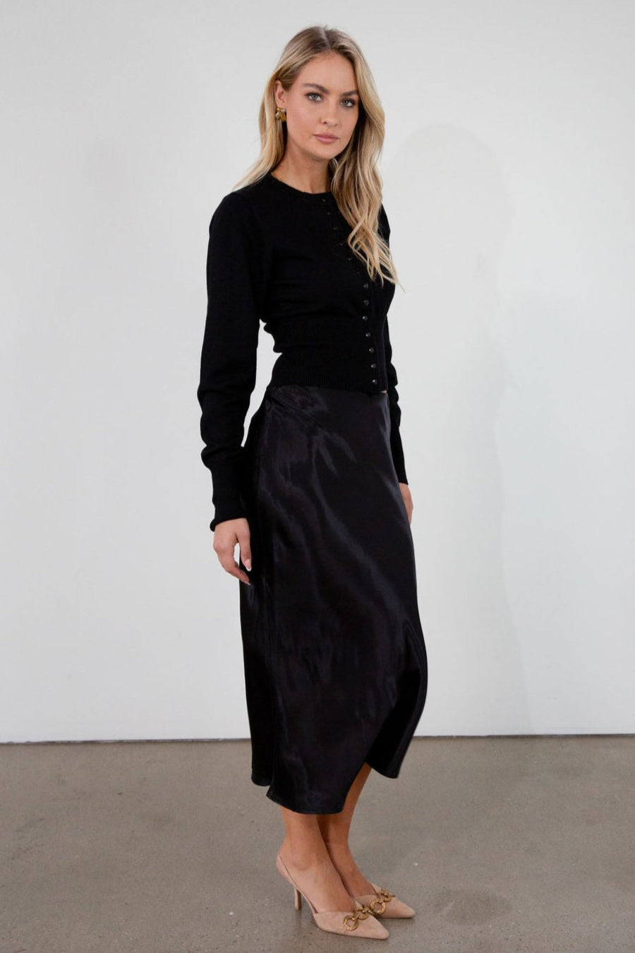 Black satin maxi skirt. Elastic waist. Side hook and eye and zipper closures. Unlined. fall skirt. fall bottom. holiday skirt