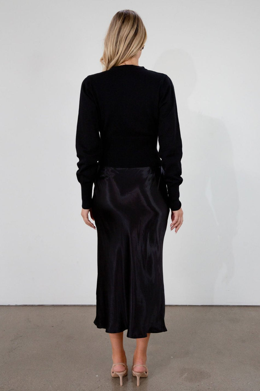 Black satin maxi skirt. Elastic waist. Side hook and eye and zipper closures. Unlined. fall skirt. fall bottom. holiday skirt