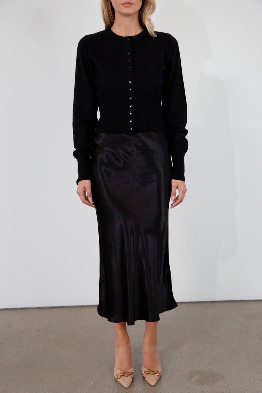 Black satin maxi skirt. Elastic waist. Side hook and eye and zipper closures. Unlined. fall skirt. fall bottom. holiday skirt