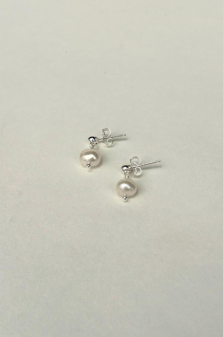 Sterling Silver earring post with freshwater pearls
Size and shape of pearls may vary