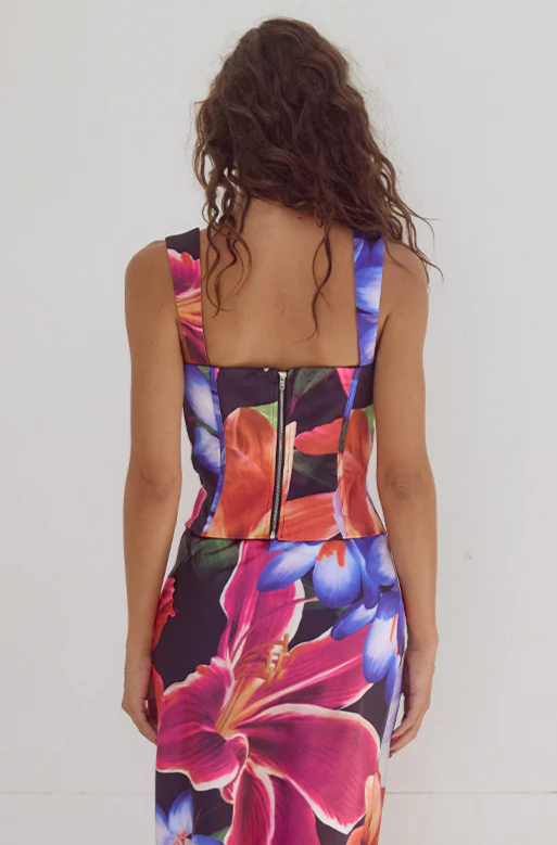 Printed satin bustier top. Fixed straps. Underwire cups. Boning in bodice. Exposed back zipper closure. Fully lined. Floral bustier top. floral dress set