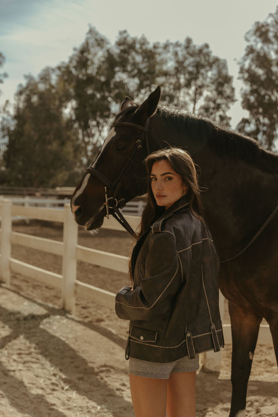 Faux leather jacket. Front zipper closure. Long sleeves either zipper closures. Front zipper pockets. Snap button closures. Fully lined. Brown leather jacket. brown oversized leather jacket. western outfit. ranch outfit