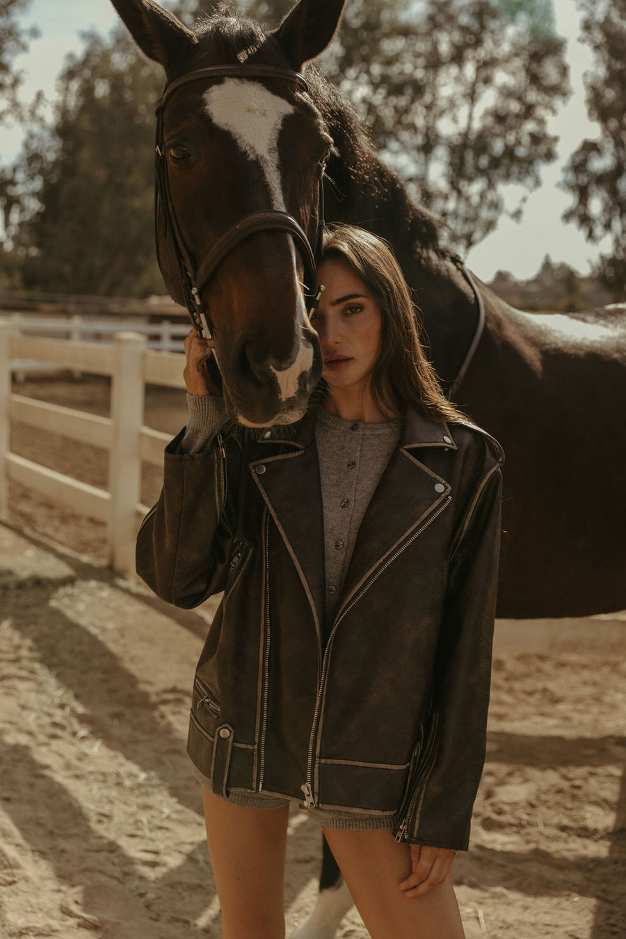Faux leather jacket. Front zipper closure. Long sleeves either zipper closures. Front zipper pockets. Snap button closures. Fully lined. Brown leather jacket. brown oversized leather jacket. western outfit. ranch outfit