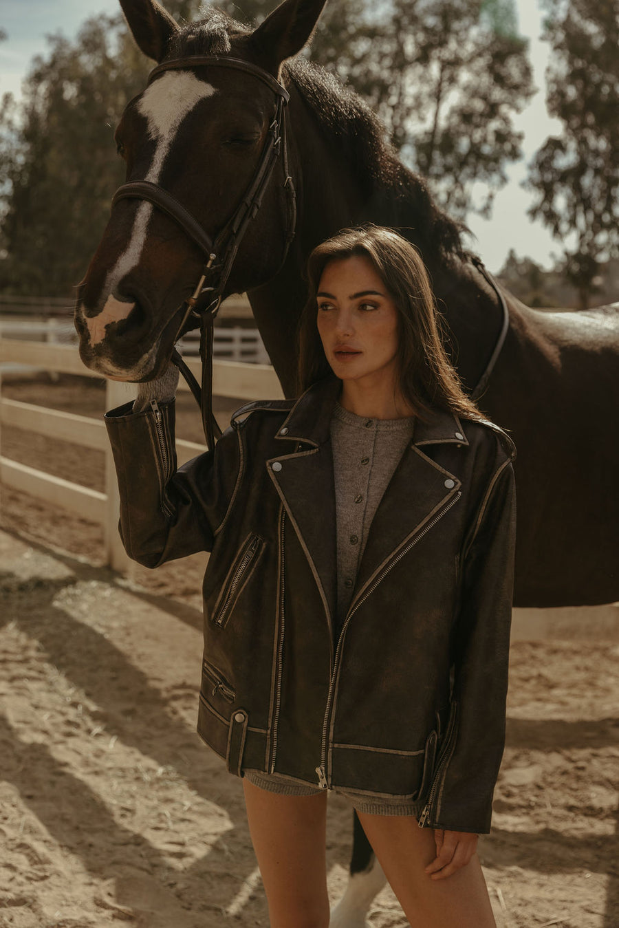Faux leather jacket. Front zipper closure. Long sleeves either zipper closures. Front zipper pockets. Snap button closures. Fully lined. Brown leather jacket. brown oversized leather jacket. western outfit. ranch outfit