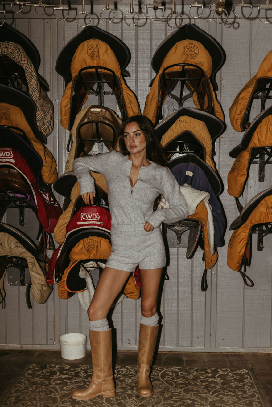 Fuzzy heather knit bodysuit. Long sleeves. Front button down closures. Snap bottom closures. Thong back. Fuzzy heather knit shorts. Unlined. grey knit set