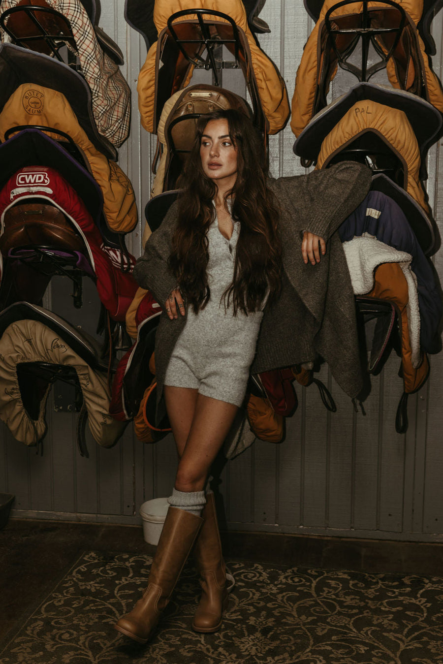 Fuzzy heather knit bodysuit. Long sleeves. Front button down closures. Snap bottom closures. Thong back. Fuzzy heather knit shorts. Unlined. grey knit set