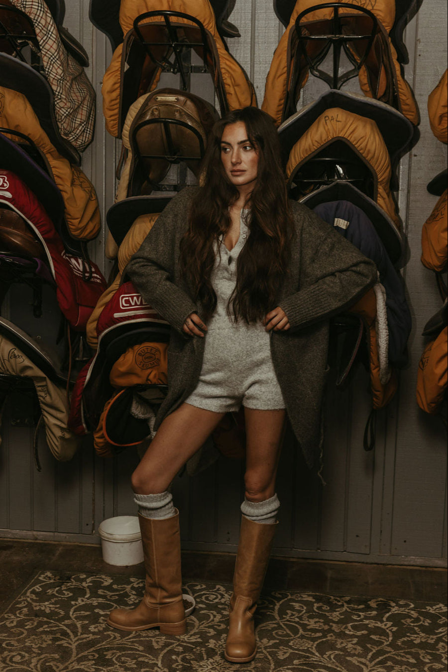 Fuzzy heather knit bodysuit. Long sleeves. Front button down closures. Snap bottom closures. Thong back. Fuzzy heather knit shorts. Unlined. grey knit set