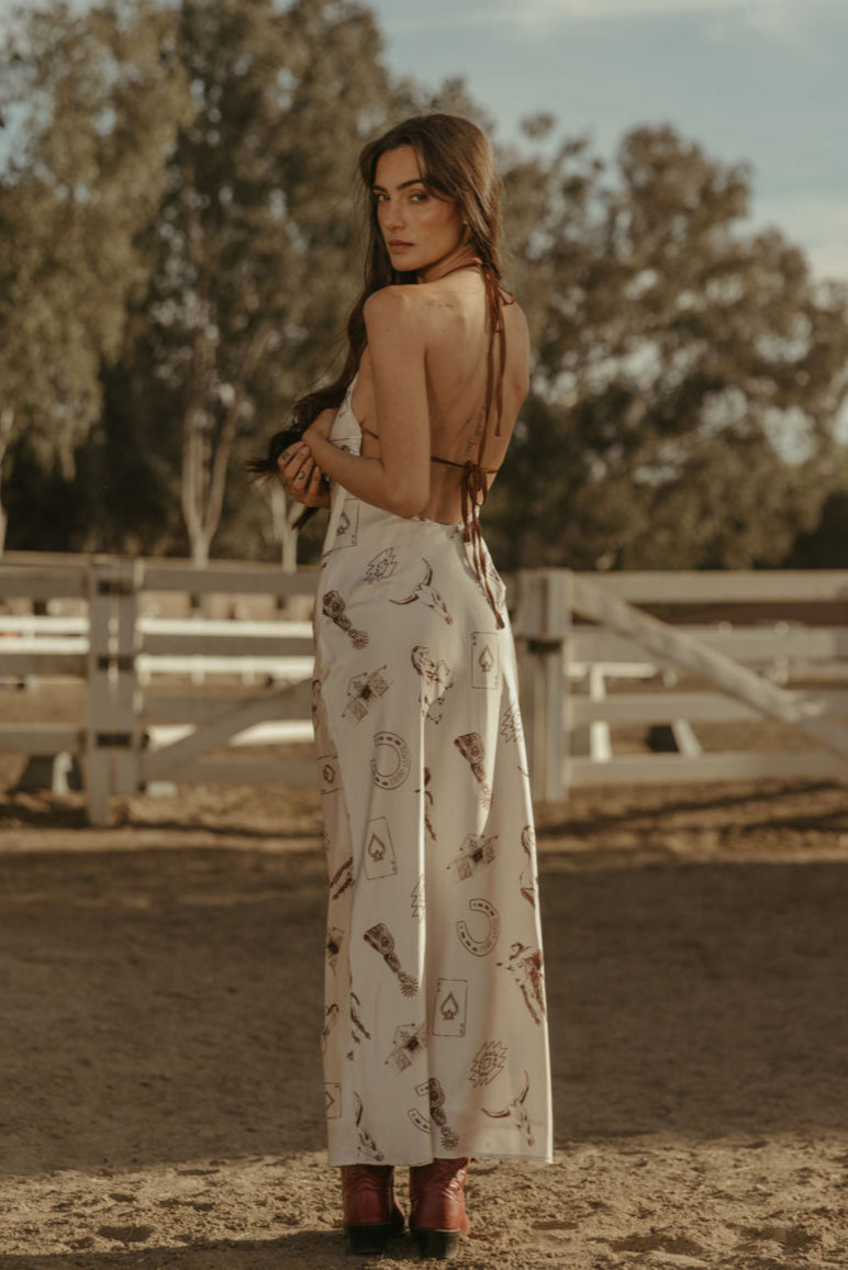 Printed satin maxi dress. Halter neckline with back tie closure. Side zipper closure. Fully lined. horse dress. ranch shoot. 