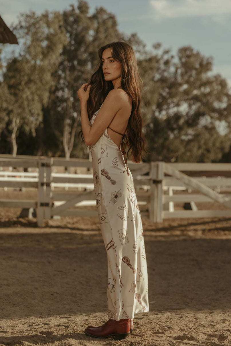 Printed satin maxi dress. Halter neckline with back tie closure. Side zipper closure. Fully lined. horse dress. ranch shoot. 