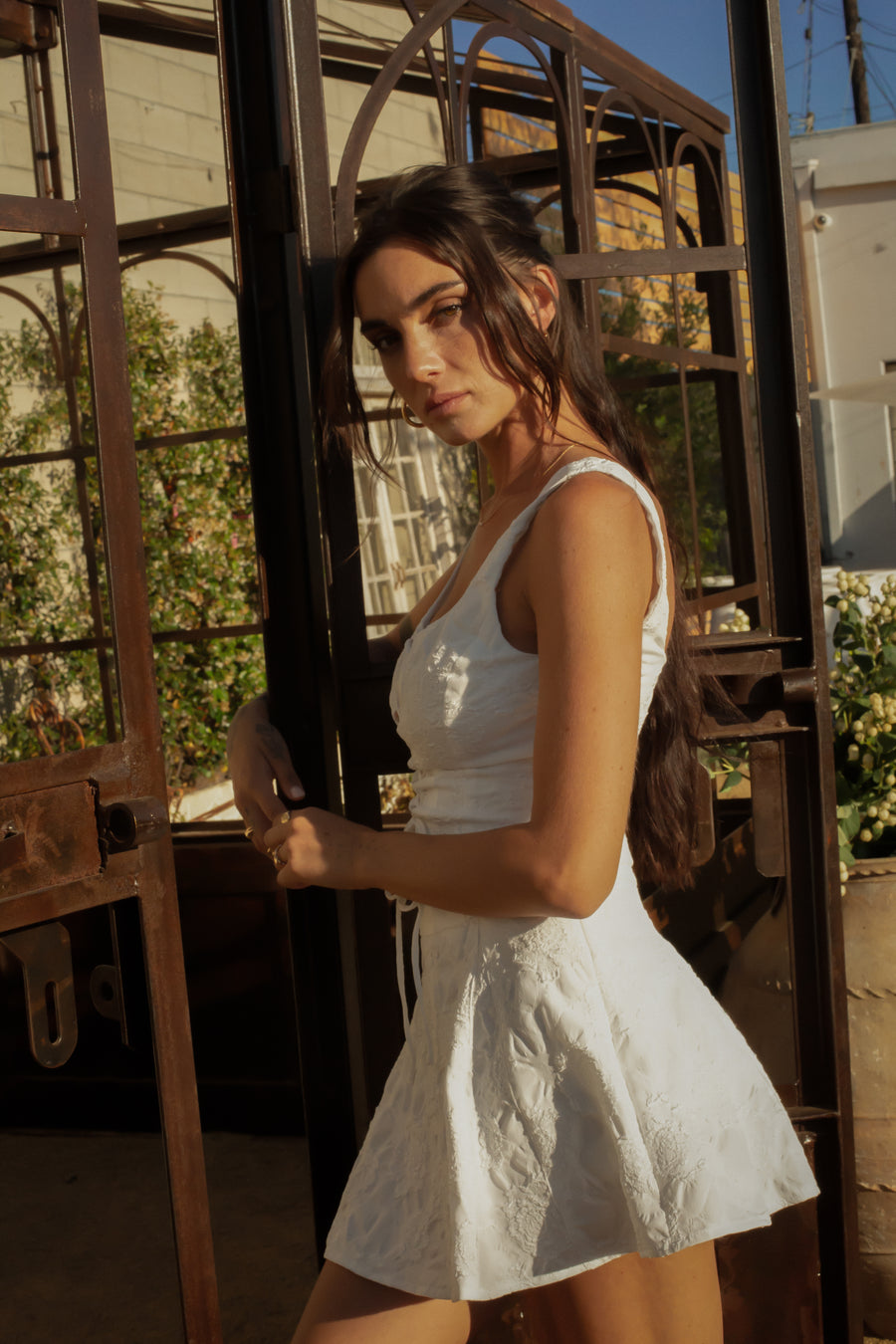 Floral woven corset top. Fixed straps. Front lace up closure. Side zipper closure. Fully lined. European summer vacation. European summer outfit. European summer. European summer top. European summer aesthetic. Tuscany outfit inso. Tuscany aesthetic. Summer top. white lace corset. summer outfit. everyday top. vacation top. outfit to wear to tuscany. white floral lace top
